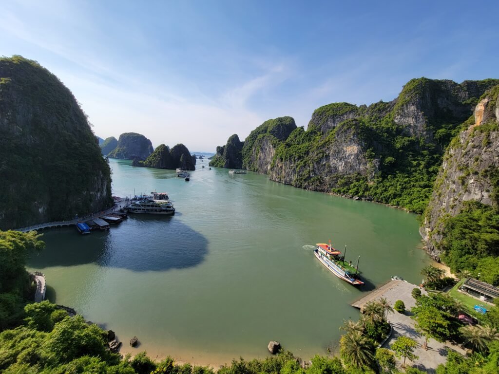 Turquoise bay ringed by limestone karsts in Ha Long Bay, Vietnam