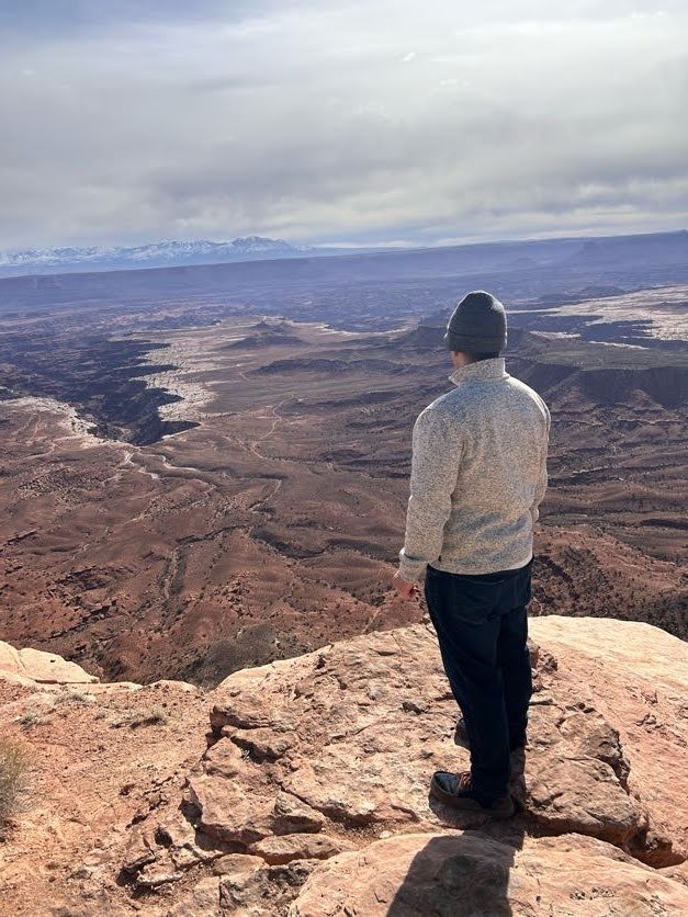 Looking out over red-rock canyons toward the La Sal Mountains in Canyonlands, Utah